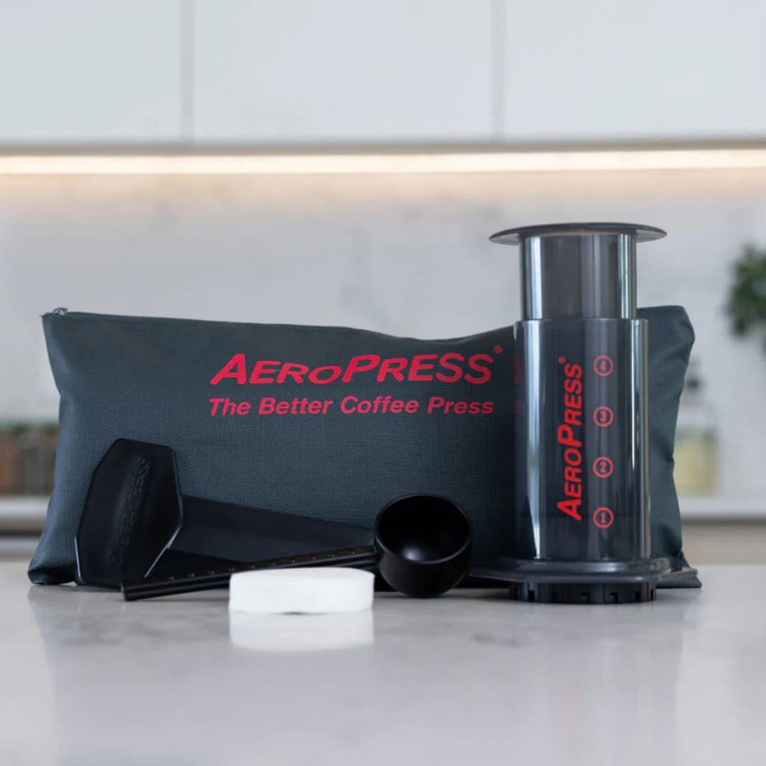 https://www.frenchpresscoffee.com/cdn/shop/files/AeroPressassembledwithToteBag.png?v=1683661348